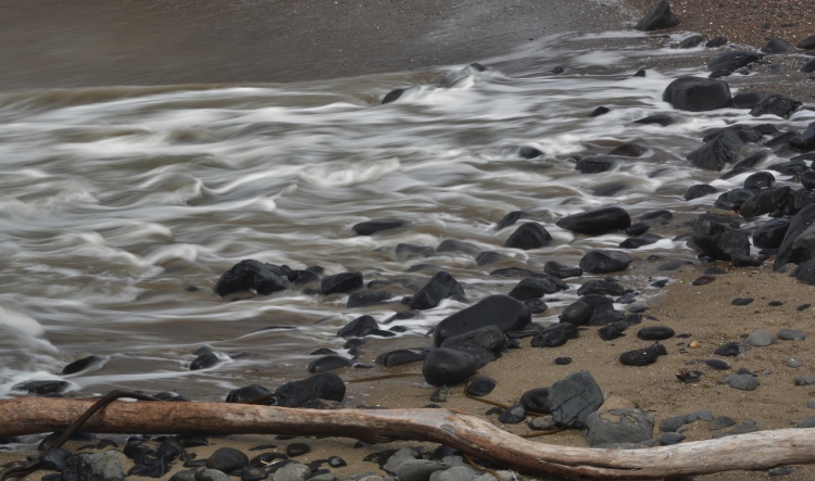 water over rocks in slow-motion